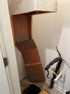 Exposed HVAC ductwork and piping during an installation or renovation project by McTeer's Heating & Cooling in Salisbury, MD.