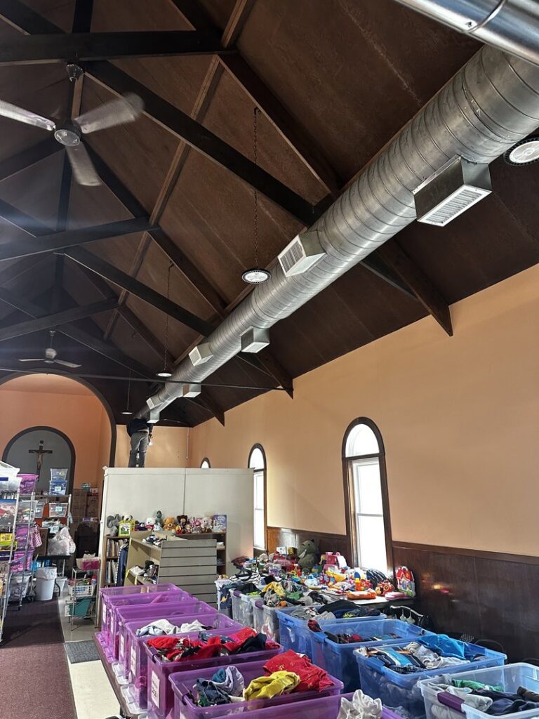 Exposed spiral ductwork installed in a commercial space by Advanced HVAC and Plumbing in Morgantown, WV.