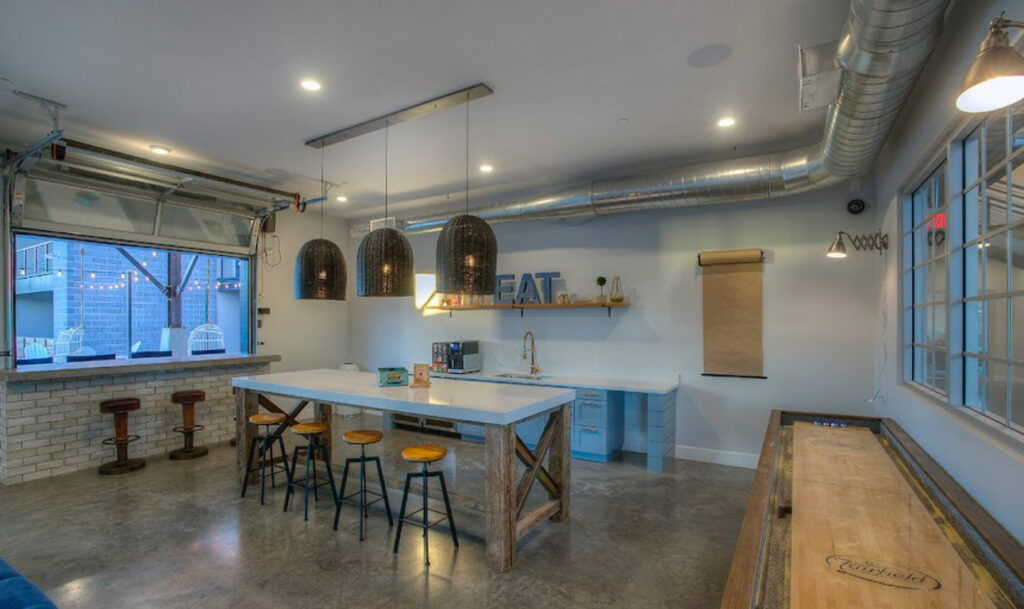 Modern interior design featuring exposed spiral HVAC ductwork installed by Sun Devil Heating & Cooling INC in Peoria, AZ.