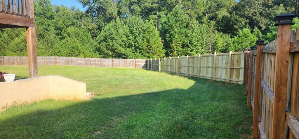 An extensive backyard wood fence project completed by 3A Fencing & Landscaping in Atlanta, GA.