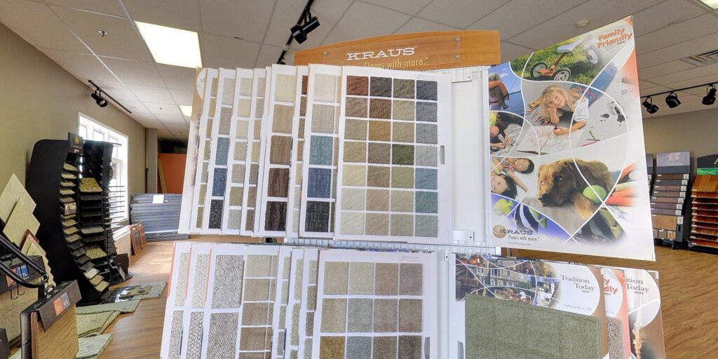 An extensive display of various carpet samples in the showroom of West Michigan Flooring & Interiors in Byron Center, MI.
