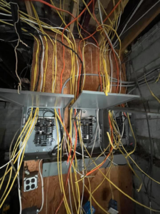 Extensive electrical wiring and multiple panels installed within a wooden structure by CJ Lighting Solution LLC in Greensboro, NC.