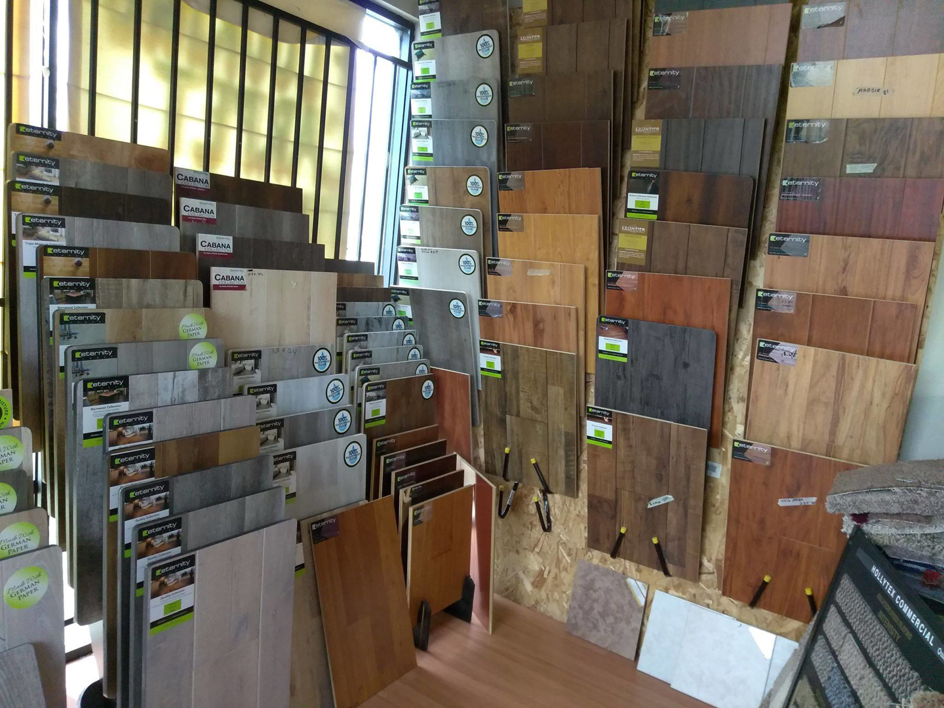An extensive display of various flooring samples in the showroom at The Carpet Plaza in Bakersfield, CA
