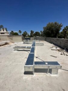 Extensive rooftop HVAC ductwork installation on a commercial building by BH cooling & Heating in Glendale, AZ.