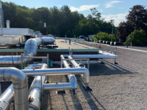 Extensive rooftop HVAC system with insulated pipes and ducts by North Country Mechanical Insulators in South Burlington, VT.