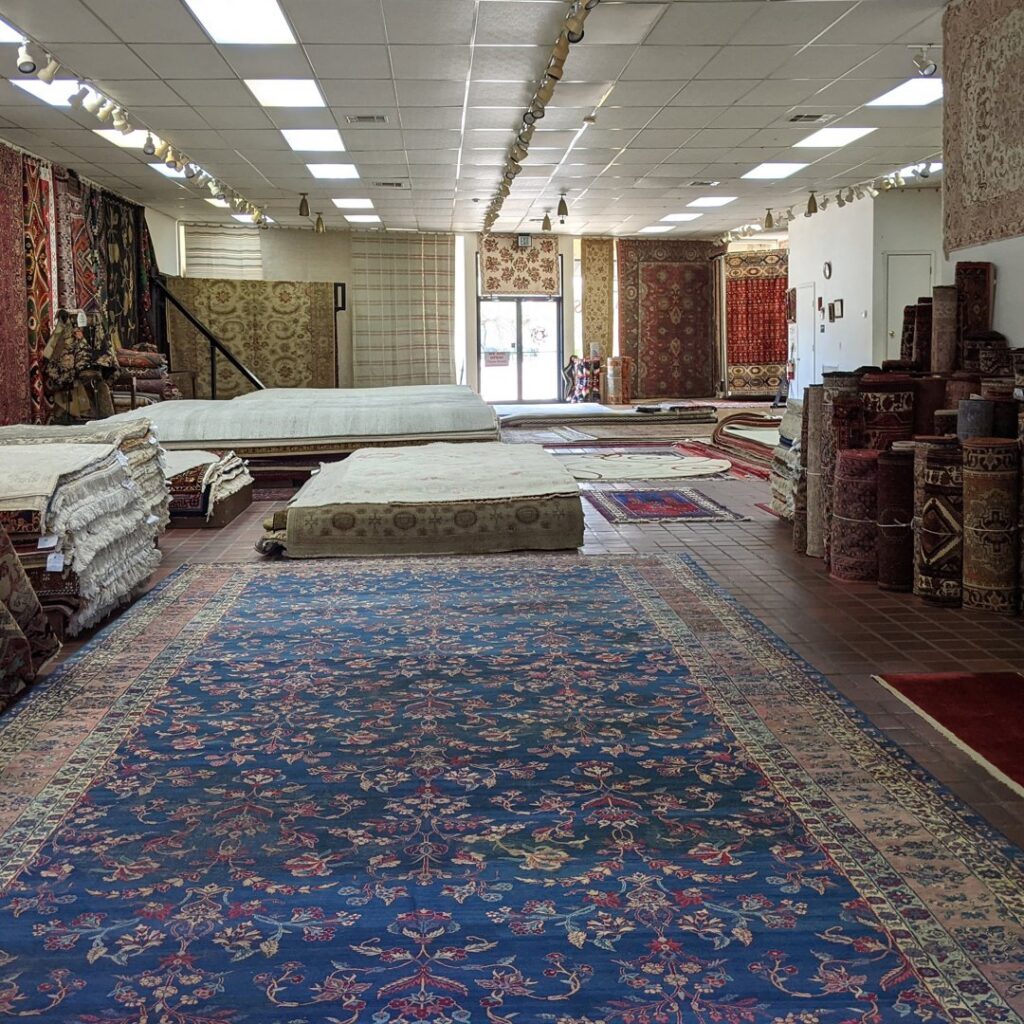 An extensive selection of rugs displayed throughout the showroom of Woven Treasures, Inc in Mobile, AL.
