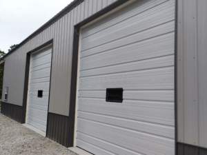 Exterior view of two commercial garage doors recently installed by Horton & Hill Garage Door Specialists LLC in Sapulpa, OK.