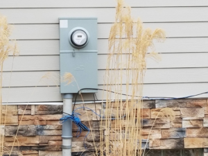 An exterior electric meter and panel on a building, installed by Cargo Electric LLC in Pittsburgh, PA