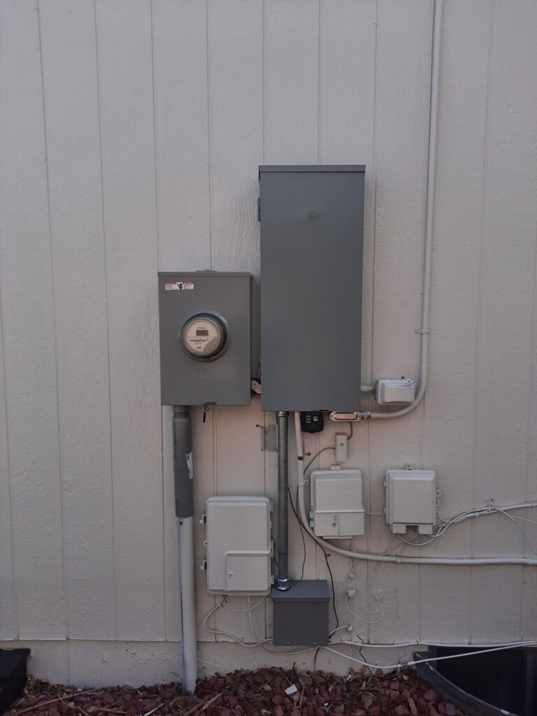 Complex exterior electrical conduit and box installation by Midway Electric Inc. in Columbia, MO.