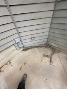 Exterior electrical conduit running neatly along the side of a building, installed by Legacy Electric in Westminster, CO.