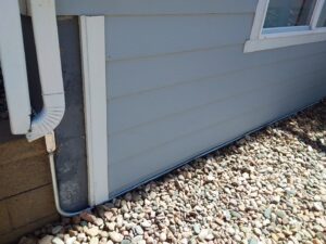Exterior electrical conduit and grounding installed by Swartz Electric on a residential building in Colorado Springs, CO.