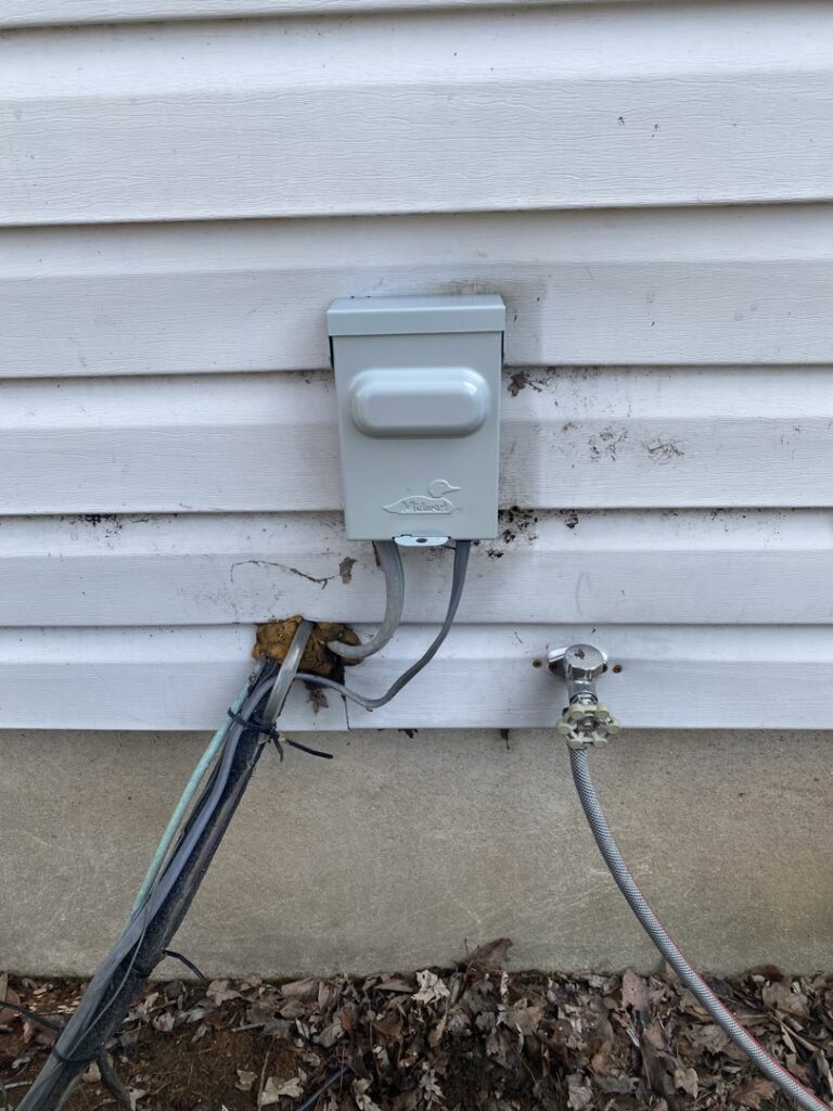 Exterior electrical conduit and junction box installation on a residential building by CLB Electrical LLC in Townsend, DE.
