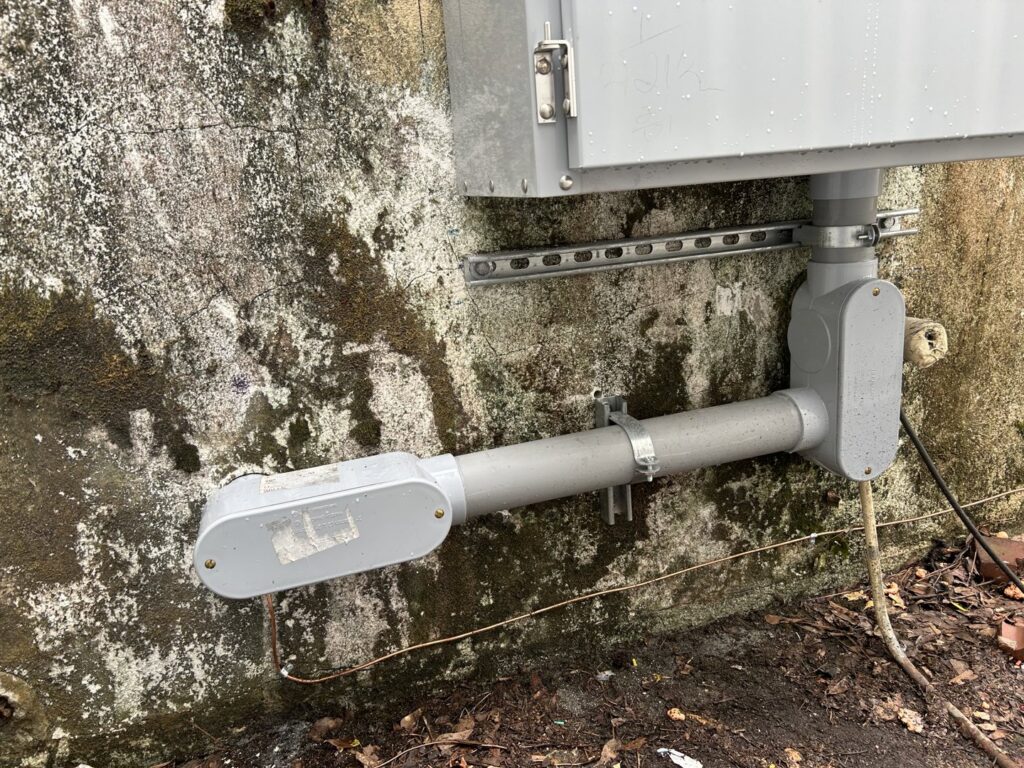 Exterior electrical conduit and junction boxes installed by Parks Electric & Mechanical Co. in Newport News, VA.