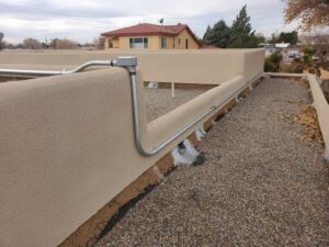 Exterior electrical conduit installation on a building by True Light Electric in Albuquerque, NM.
