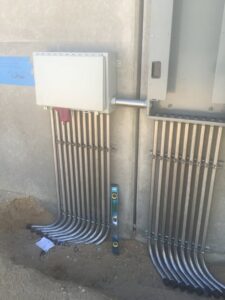 Exterior electrical conduit routing and installation by New Revelation Technologies LLC in Nampa, ID.