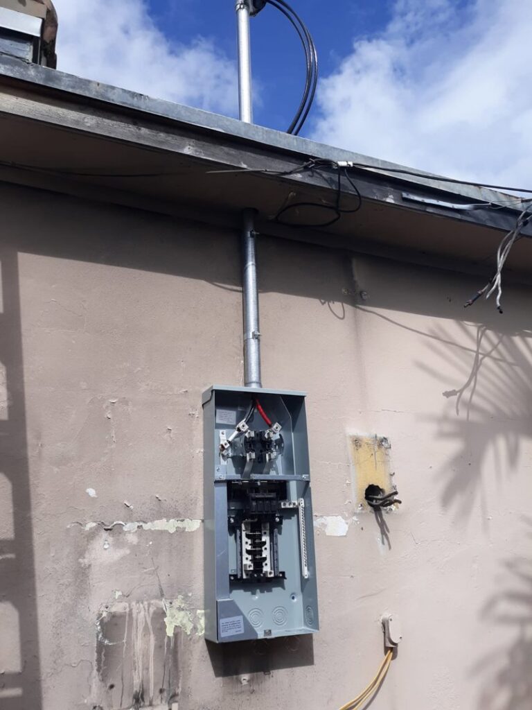 An exterior electrical meter box and conduit installation by Electricians On Call in Fort Lauderdale, FL.