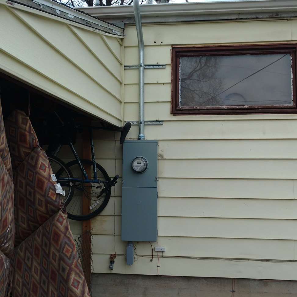 Exterior electrical meter box and conduit installation by Illuminate Electric, Inc. in Denver, CO