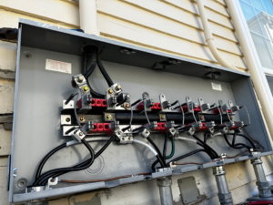 An exterior electrical meter box with new wiring and connections by J. K. Quality Electric in Saint Bernard, LA.