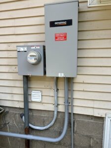 Exterior electrical meter and service disconnect box installed by Ardent Electric in Erie, PA.