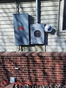 Exterior electrical meter and disconnect panel installation by Midway Electric Inc. in Columbia, MO.