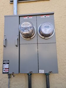 An exterior electrical meter panel with two utility meters, installed by Muse Electricians in Los Angeles, CA.