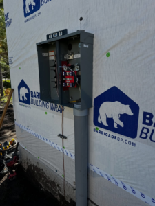 Exterior electrical meter base and conduit installation on a new home by Bold City Electric in Jacksonville, FL.