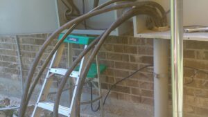 Exterior electrical meter and service panel installation on a residential building by A Renewable Electric LLC in Houston, TX.