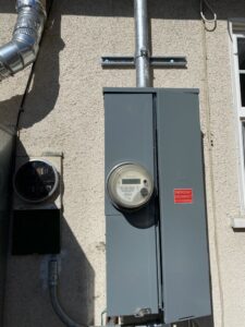 An exterior electrical panel and meter installation by CLB Electric Corporation in Norwalk, CA
