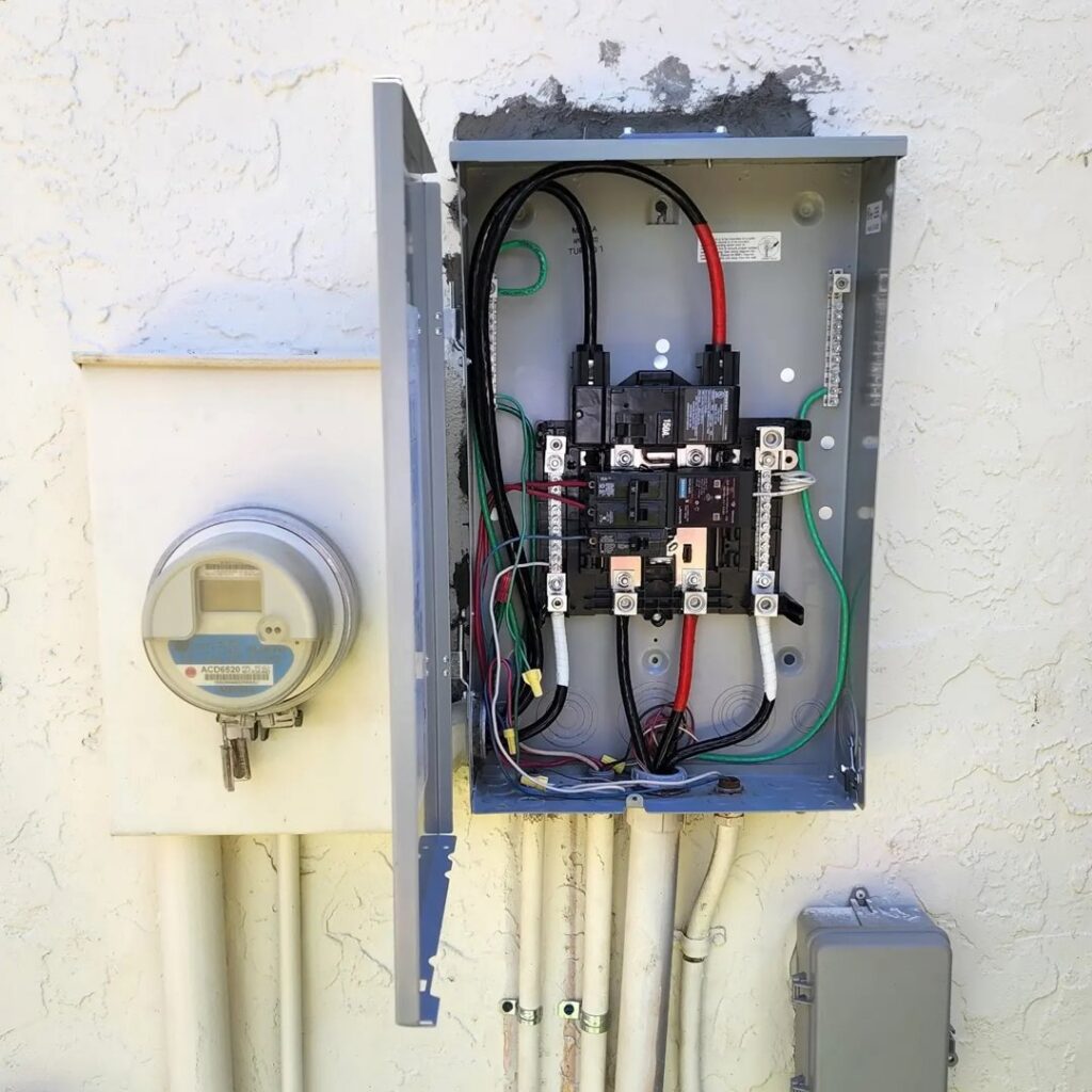 Exterior electrical panel and meter installation by Elite Electrical Concepts, LLC in Deerfield Beach, FL.
