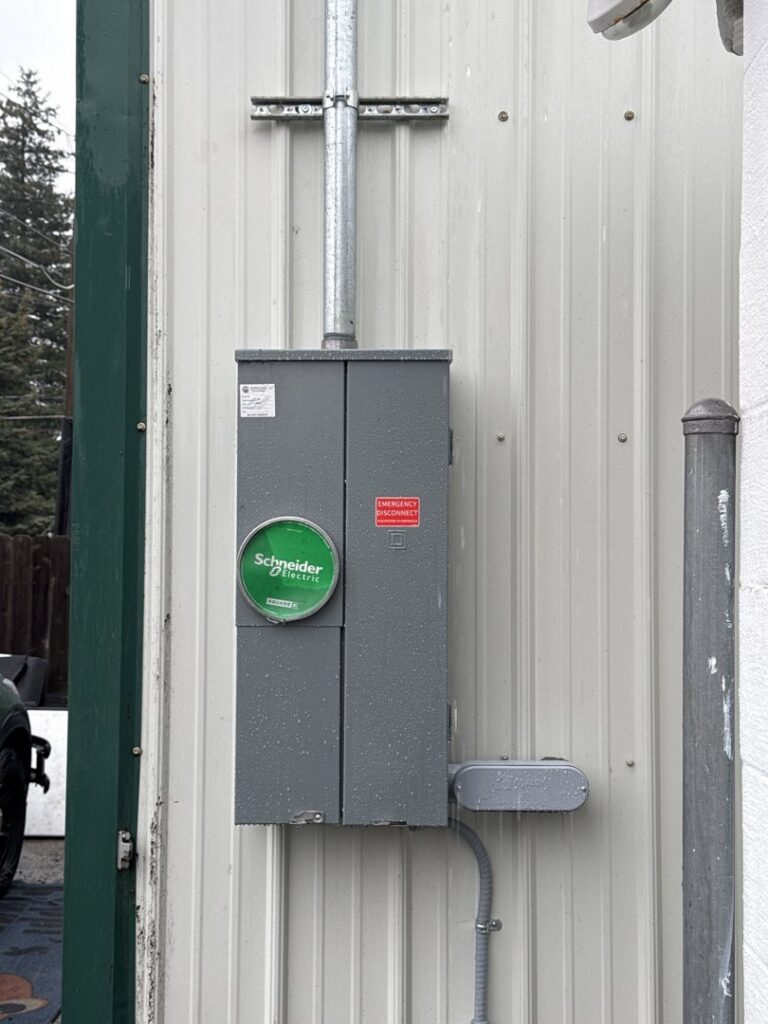 A close-up of an exterior electrical panel with a main disconnect installed by LN Electrical in Coeur D Alene, ID