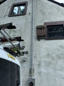New exterior electrical conduit and meter box installed on a house by York Electric of Westchester in Yonkers, NY.