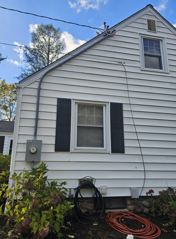Exterior electrical service entrance and meter on a house, installed by Joey G Electric LLC in Waterbury, CT.