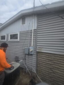 Exterior electrical service upgrade and meter installation on a house by JAL Electrical Construction in Hammond, IN.