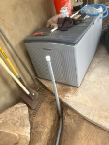 Exterior trenching and electrical conduit installation for a home by Sparks By Rabbit LLC in Scottsdale, AZ.