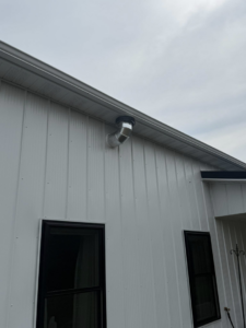 An exterior HVAC vent pipe installation on a building by Freedom Heating & Cooling in Lathrop, MO.