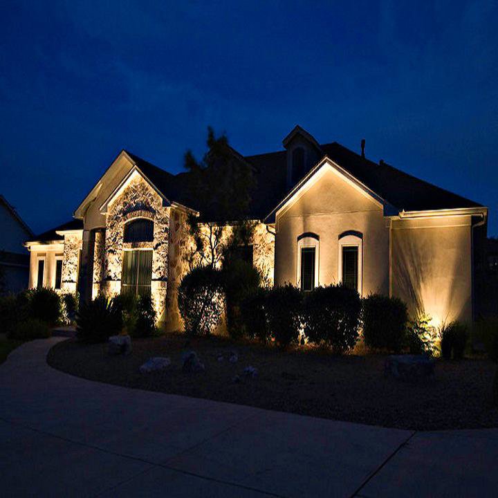 Beautiful exterior landscape lighting installed on a house by Acme Electrical & Ac Services Inc in Tampa, FL.