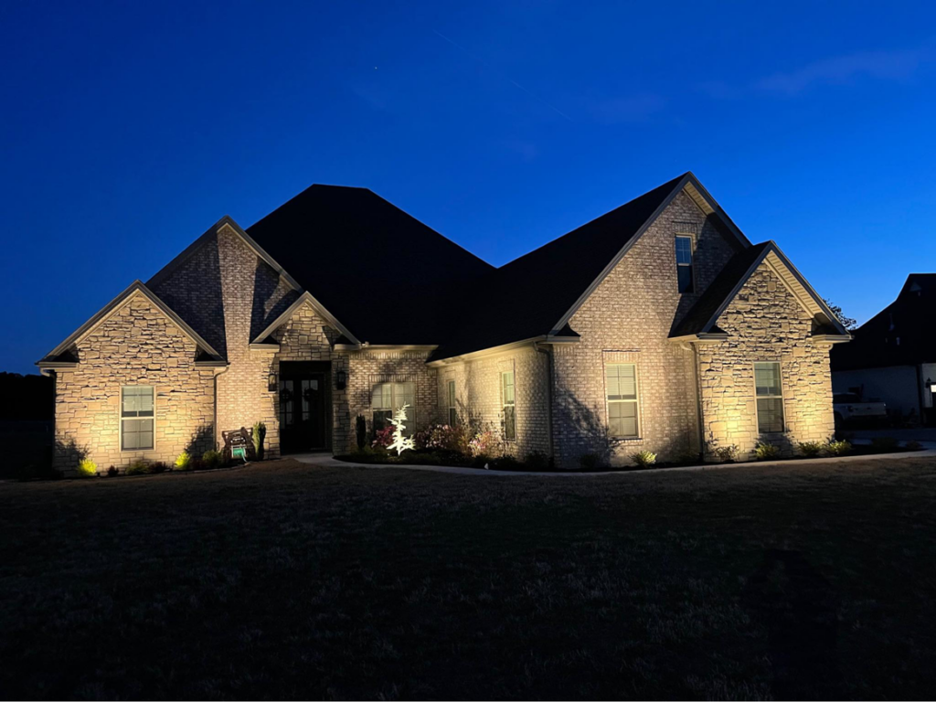 Beautiful exterior landscape lighting installed on a home by Brian Jackson Electrical Service LLC in Sadler, TX