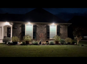 Newly installed exterior soffit lighting illuminating a home by Light of the World Electric in Lake City, FL.