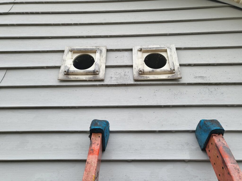 Exterior vents on a house, identified as potential wildlife entry points by New England Wildlife Control in Salem, NH.