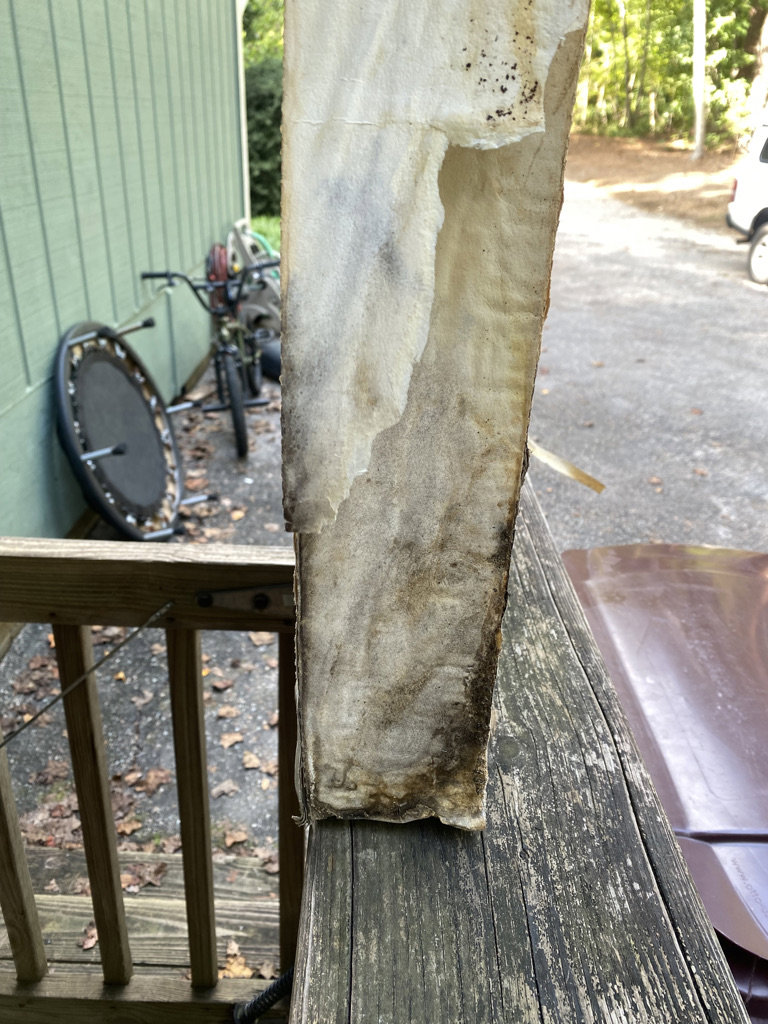 An extremely dirty and possibly moldy HVAC air filter, highlighting the need for service from Lee Air Conditioning in Lafayette, LA.