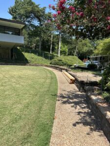 Metal fence posts being installed for a new fence project by EverFence in Dallas, TX.