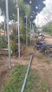 Metal fence posts being installed for a new fence project by Zelaya Fence in New York City, NY.