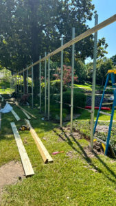 Fence posts being installed for a new fence project by EverFence in Dallas, TX.