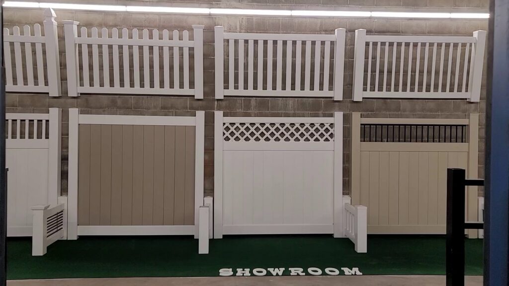 A showroom display featuring various fence styles and colors at Future Solutions Fence Supply in York, PA