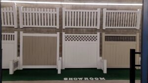 A showroom display featuring various fence styles and colors at Future Solutions Fence Supply in York, PA