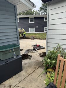 Fencing contractors from Fence Connection, Inc. installing a new fence in Elgin, IL.