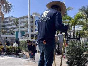 Fencing contractors from Golden Eagle Fencing working on an installation project in Tampa, FL