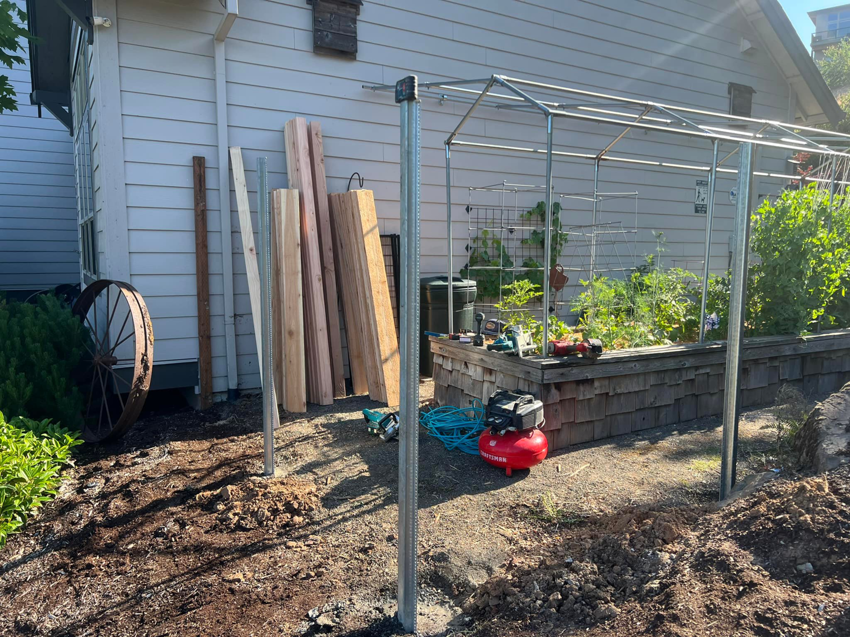 Fencing materials and tools on site for a new fence installation by RL Quality construction in Gaston, OR.