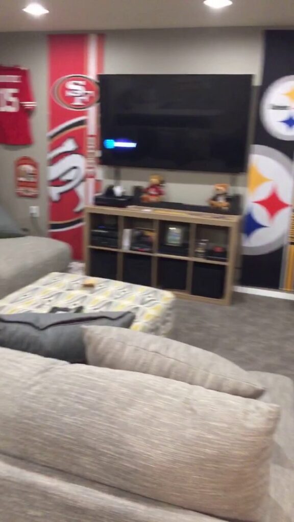 A newly carpeted basement living room, showcasing a completed installation by Mozak's Floors & More in Yankton, SD