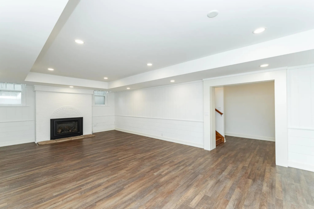 A newly finished basement featuring modern recessed lighting installed by Power Plus Electric LLC in Rochester, MN.